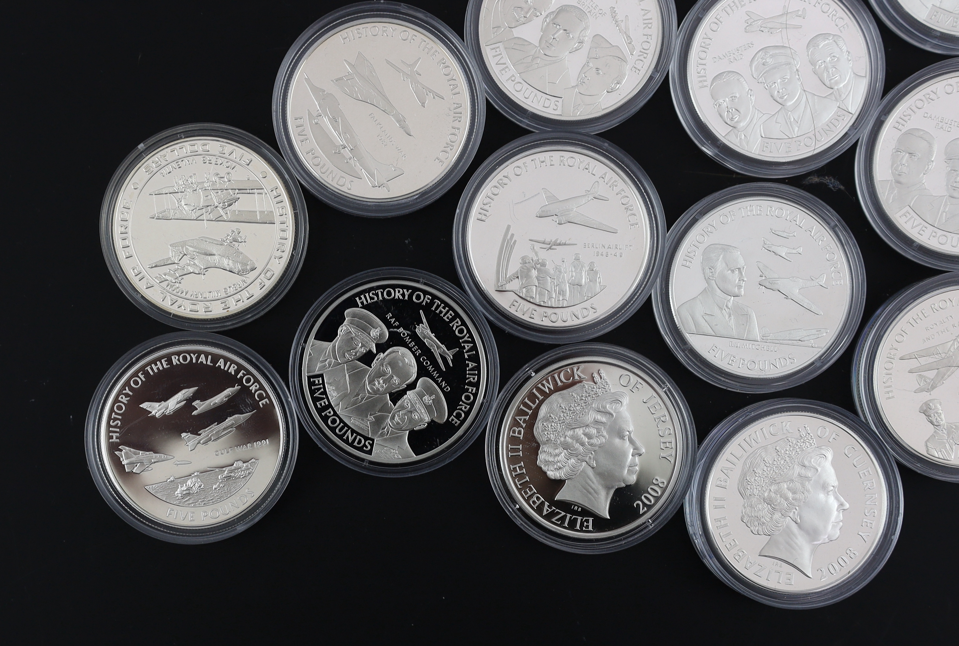 Bailiwick of Jersey and Guernsey coins, Elizabeth II, 13 History of the RAF proof silver £5 coins, 2008, a similar cupronickel coin and a Tristan da Cunha proof silver 80th anniversary Spitfire £1 coin (15)